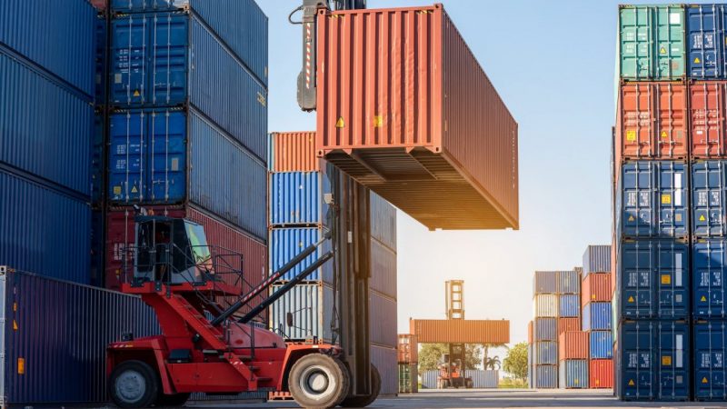 forklift-working-in-the-container-cargo-yard-port-loading-cargo-tank-logistic-service-and-transport-e1665466492906-800x450